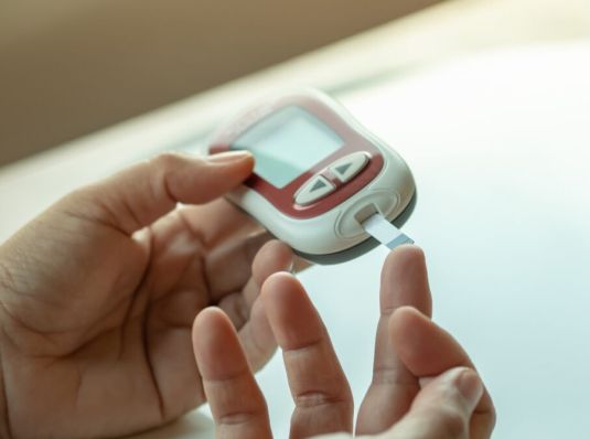 Diabetes Patient Checking Blood Sugar